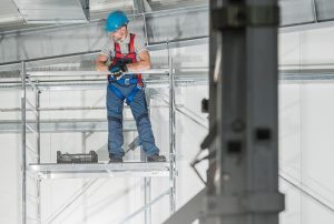 technician working on a scaffolding equipment