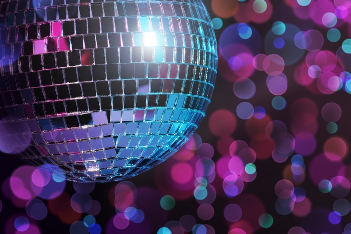 disco ball on blurred colorful background